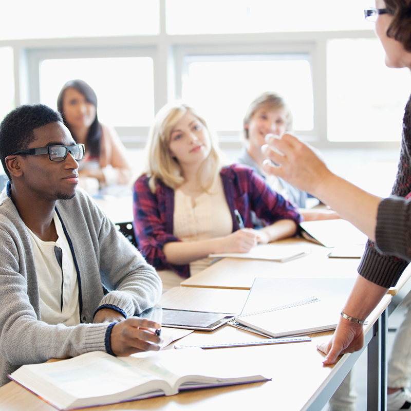 Students listening to a presentation.