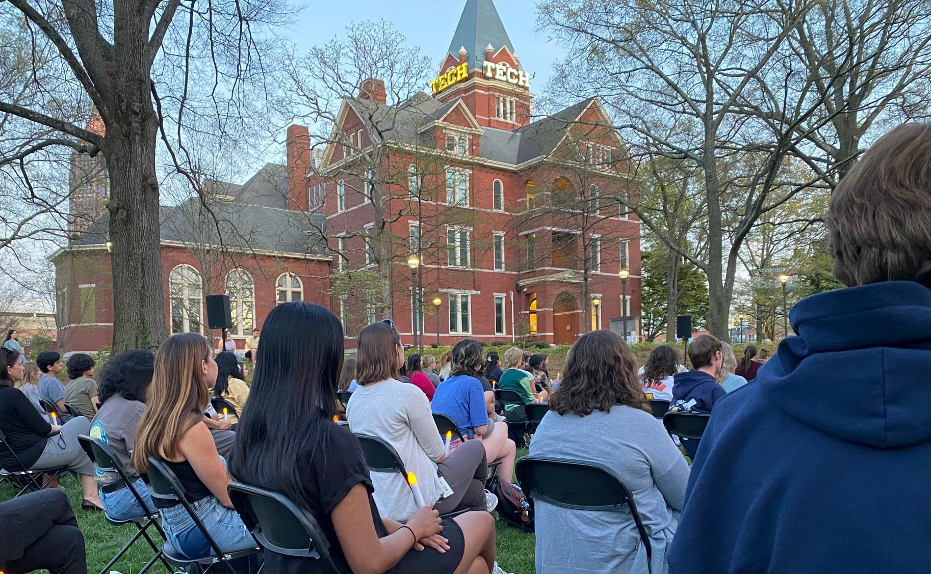 Students holding candles during Take Back the Night vigil.