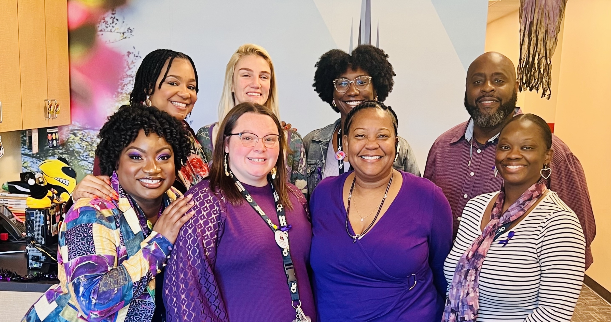 WE Center staff on Wear Purple Day